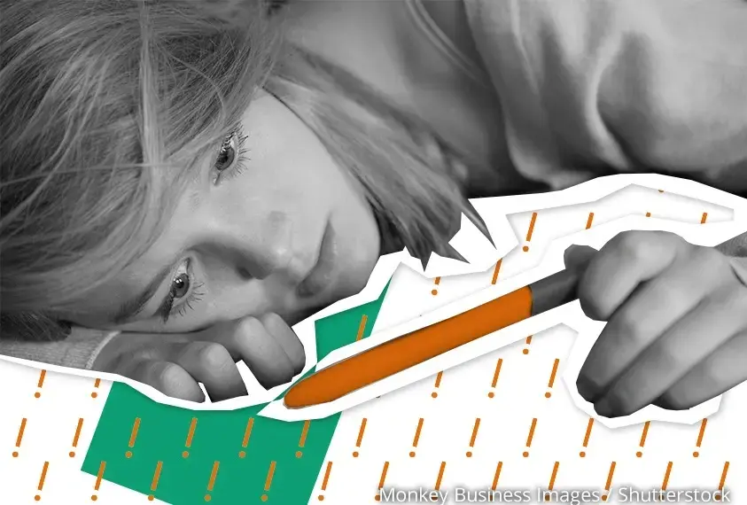 M&auml;dchen mit Schwangerschaftstest in der Hand