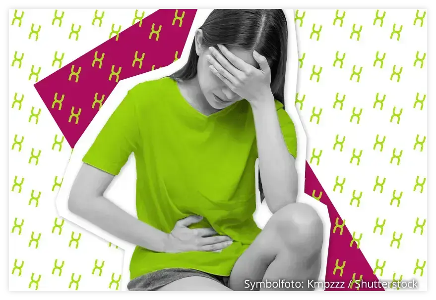 M&auml;dchen mit Schmerzen h&auml;lt sich den Unterbauch.