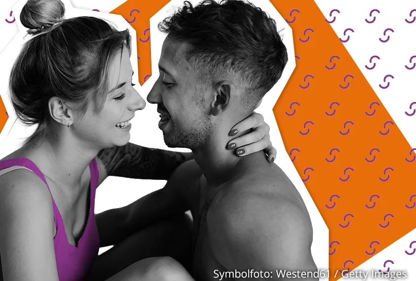 M&auml;dchen und Junge sitzen sich gegen&uuml;ber
